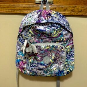 *Brand New*. Kipling - Never used backpack/Book Bag. Color - Marble Multi.